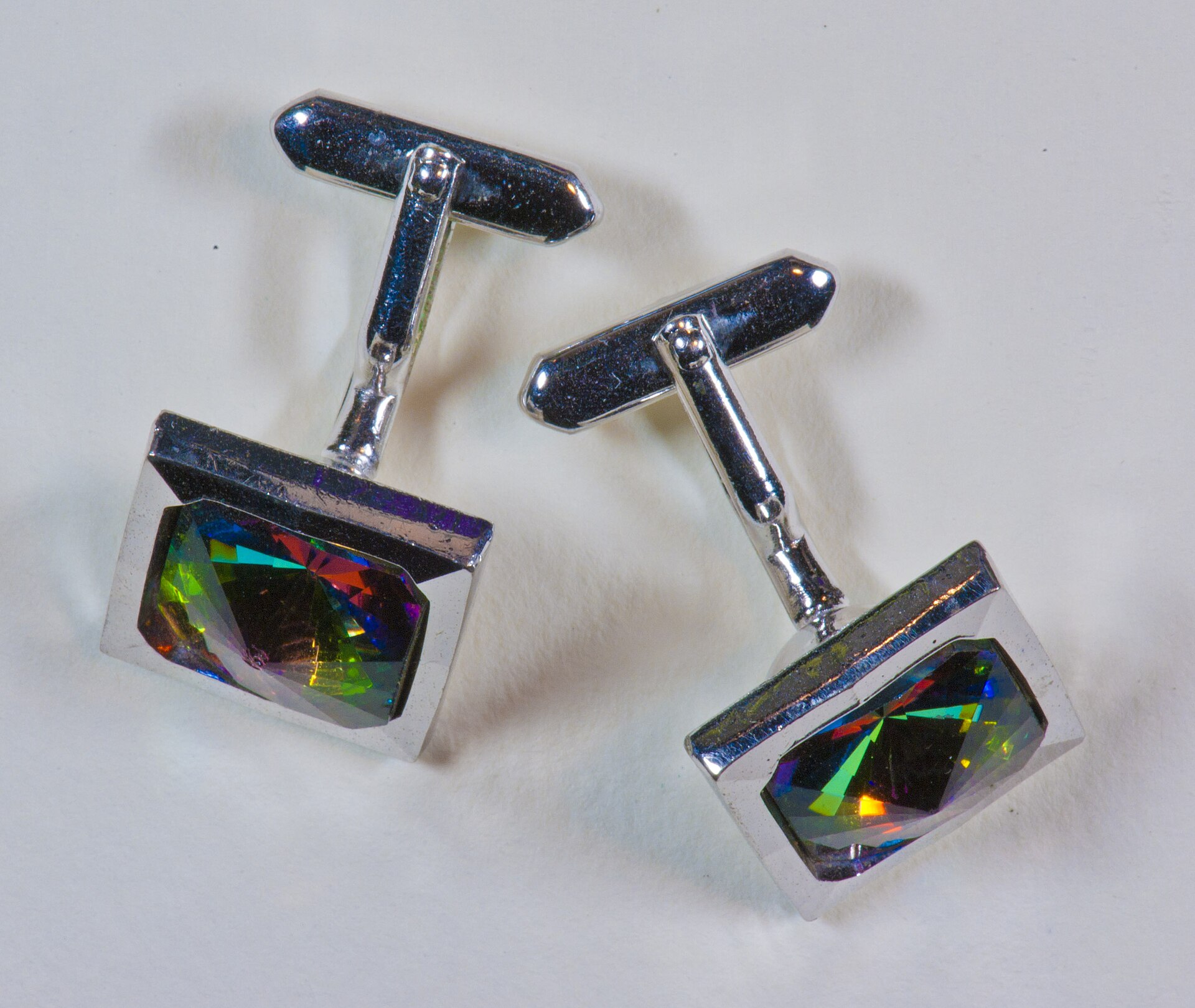 Geometric silver-tone cuff links with dark stones